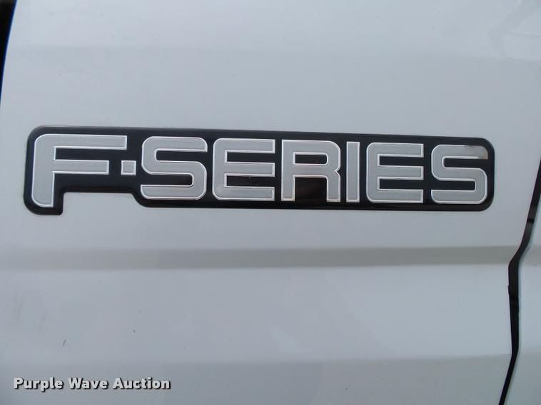 image for item K1128 1999 Ford F800 dump flatbed truck