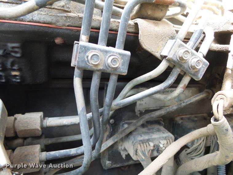 image for item K1128 1999 Ford F800 dump flatbed truck