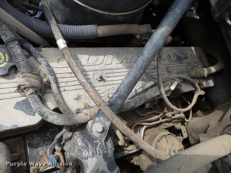 image for item K1128 1999 Ford F800 dump flatbed truck