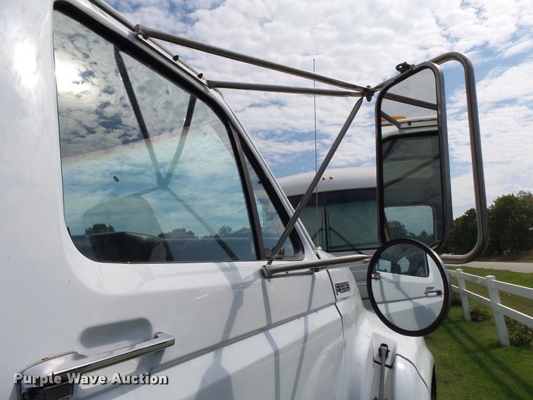 image for item K1128 1999 Ford F800 dump flatbed truck