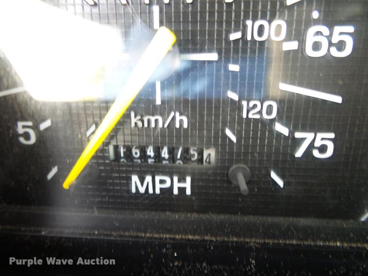 image for item K1128 1999 Ford F800 dump flatbed truck