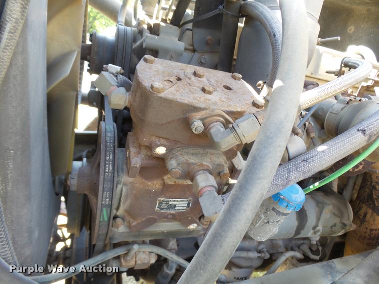 image for item L1596 1990 Ford L8000 flatbed truck