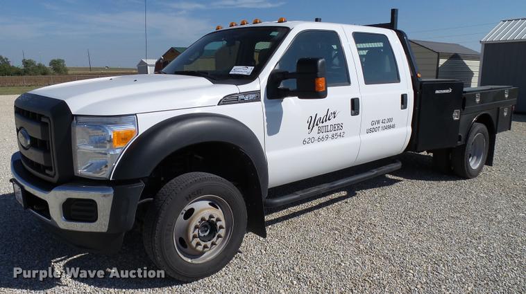 image for item L2687 2015 Ford F450 Super Duty Crew Cab flatbed pickup truck