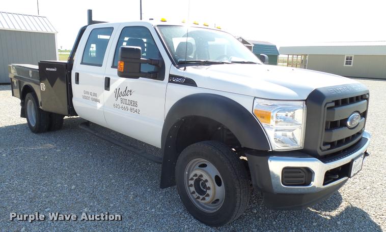 image for item L2687 2015 Ford F450 Super Duty Crew Cab flatbed pickup truck