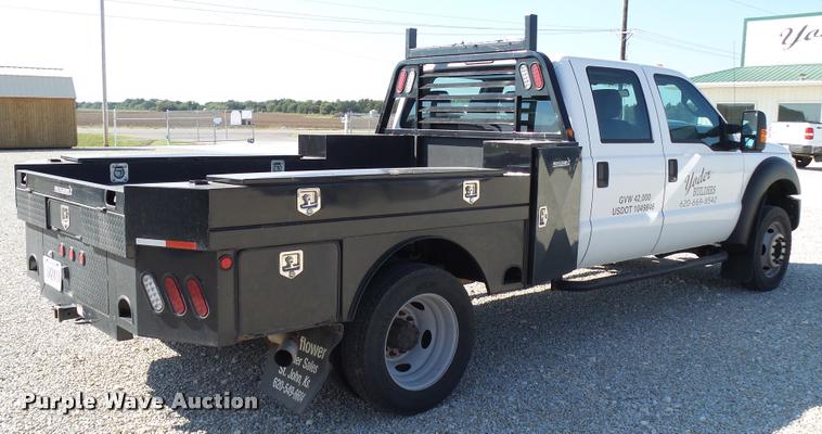 image for item L2687 2015 Ford F450 Super Duty Crew Cab flatbed pickup truck