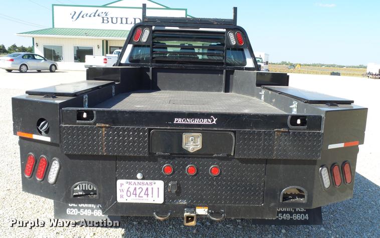 image for item L2687 2015 Ford F450 Super Duty Crew Cab flatbed pickup truck