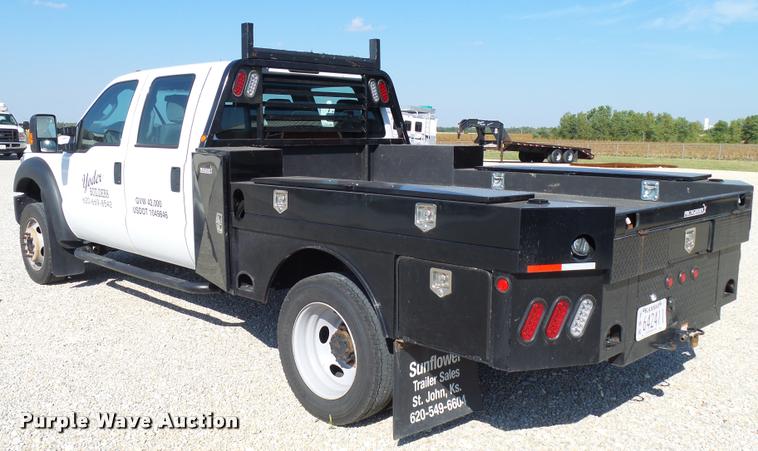 image for item L2687 2015 Ford F450 Super Duty Crew Cab flatbed pickup truck