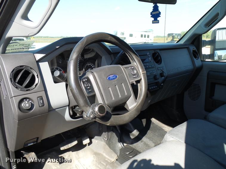 image for item L2687 2015 Ford F450 Super Duty Crew Cab flatbed pickup truck