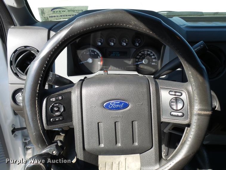 image for item L2687 2015 Ford F450 Super Duty Crew Cab flatbed pickup truck