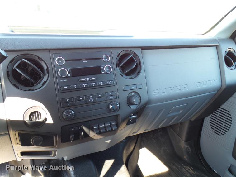 image for item L2687 2015 Ford F450 Super Duty Crew Cab flatbed pickup truck