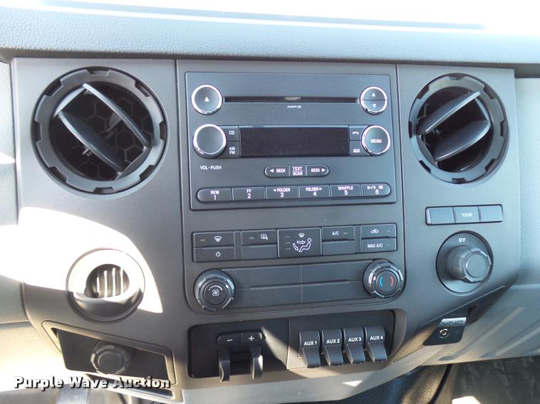 image for item L2687 2015 Ford F450 Super Duty Crew Cab flatbed pickup truck