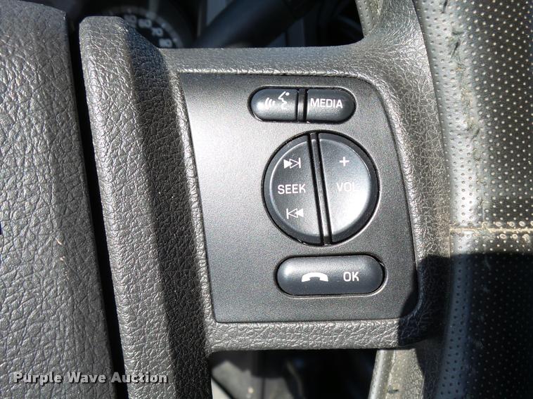 image for item L2687 2015 Ford F450 Super Duty Crew Cab flatbed pickup truck