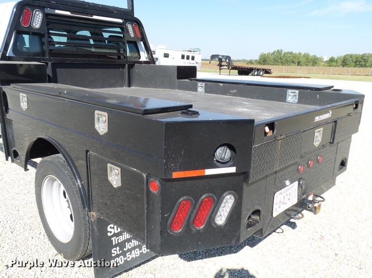 image for item L2687 2015 Ford F450 Super Duty Crew Cab flatbed pickup truck