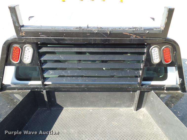 image for item L2687 2015 Ford F450 Super Duty Crew Cab flatbed pickup truck