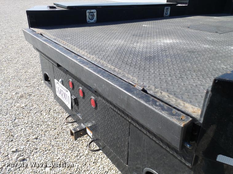 image for item L2687 2015 Ford F450 Super Duty Crew Cab flatbed pickup truck