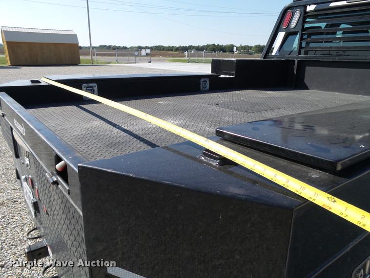 image for item L2687 2015 Ford F450 Super Duty Crew Cab flatbed pickup truck