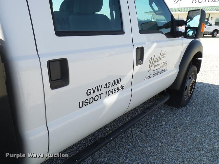 image for item L2687 2015 Ford F450 Super Duty Crew Cab flatbed pickup truck