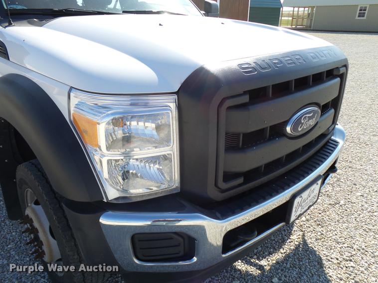 image for item L2687 2015 Ford F450 Super Duty Crew Cab flatbed pickup truck