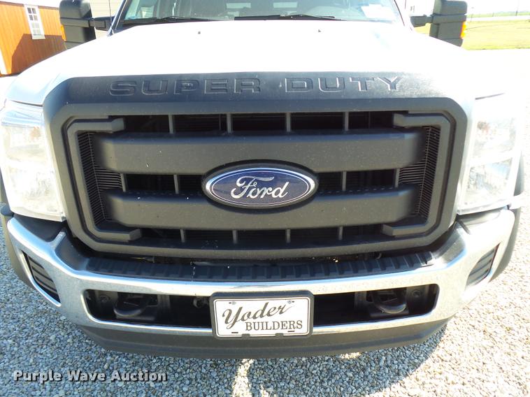 image for item L2687 2015 Ford F450 Super Duty Crew Cab flatbed pickup truck