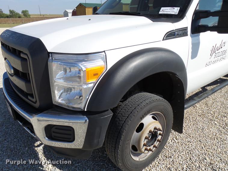 image for item L2687 2015 Ford F450 Super Duty Crew Cab flatbed pickup truck