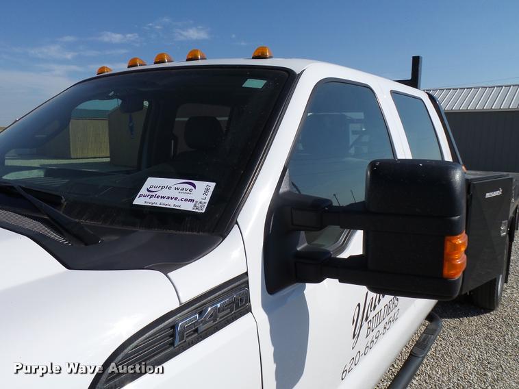 image for item L2687 2015 Ford F450 Super Duty Crew Cab flatbed pickup truck