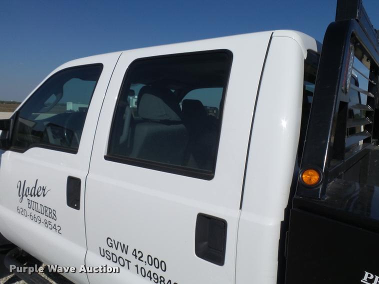 image for item L2687 2015 Ford F450 Super Duty Crew Cab flatbed pickup truck