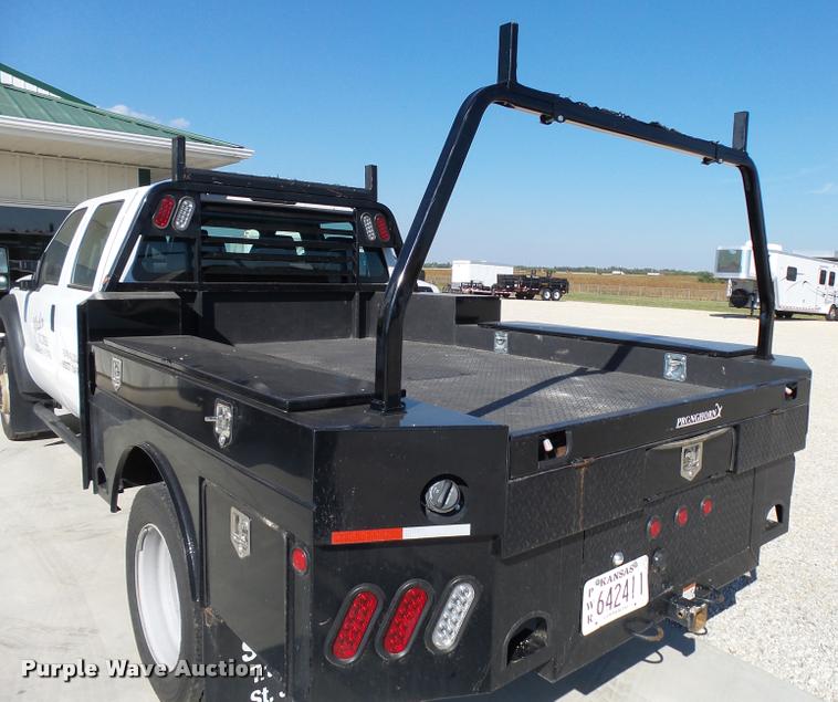 image for item L2687 2015 Ford F450 Super Duty Crew Cab flatbed pickup truck