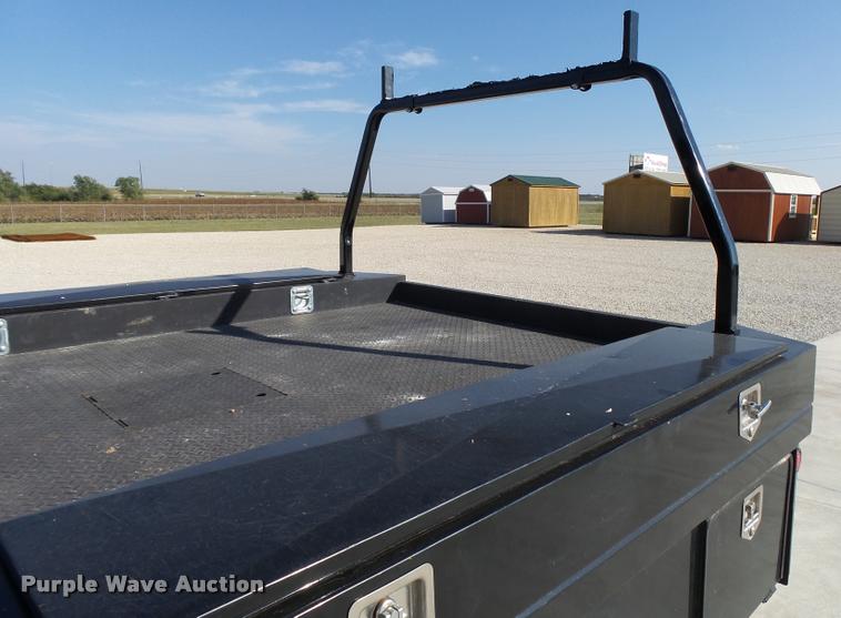 image for item L2687 2015 Ford F450 Super Duty Crew Cab flatbed pickup truck