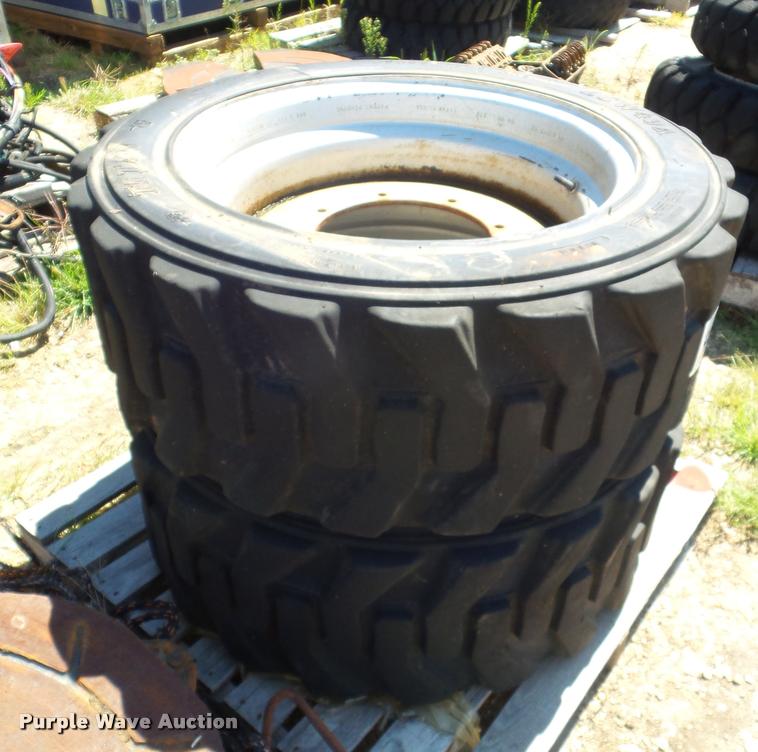 image for item L6992 (2) Titan 385-648 solid filled skid steer tires