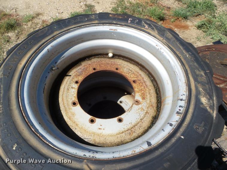 image for item L6992 (2) Titan 385-648 solid filled skid steer tires