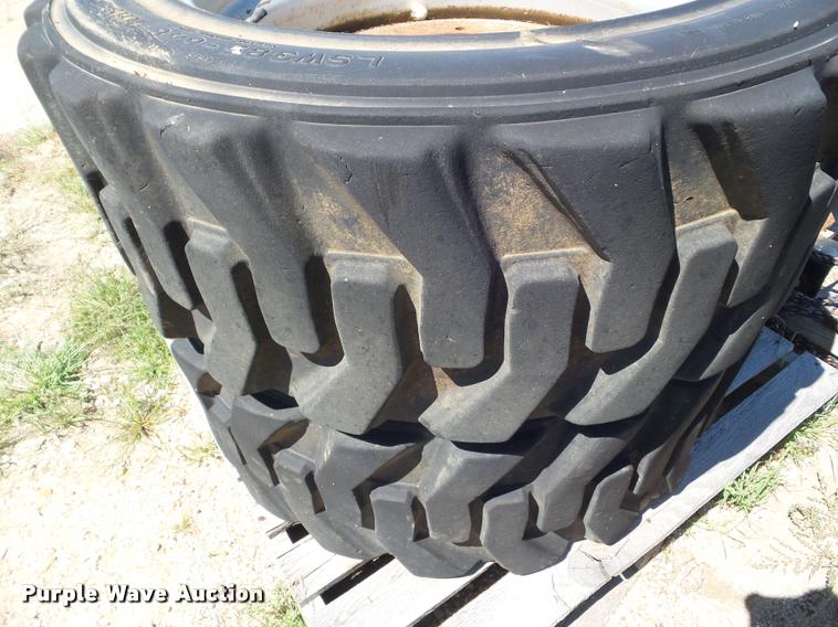 image for item L6992 (2) Titan 385-648 solid filled skid steer tires