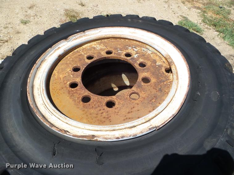 image for item L6993 (8) 8.25-20 tires and wheels
