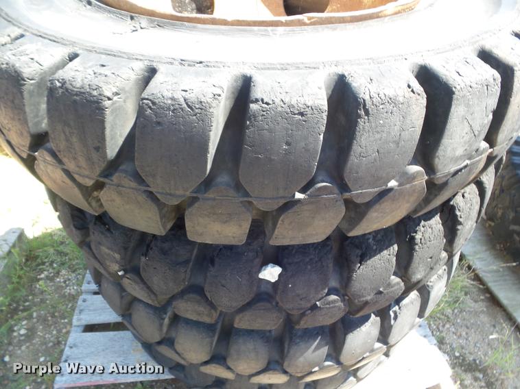 image for item L6993 (8) 8.25-20 tires and wheels