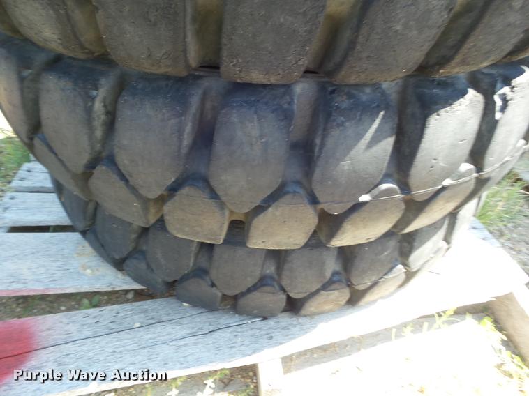 image for item L6993 (8) 8.25-20 tires and wheels