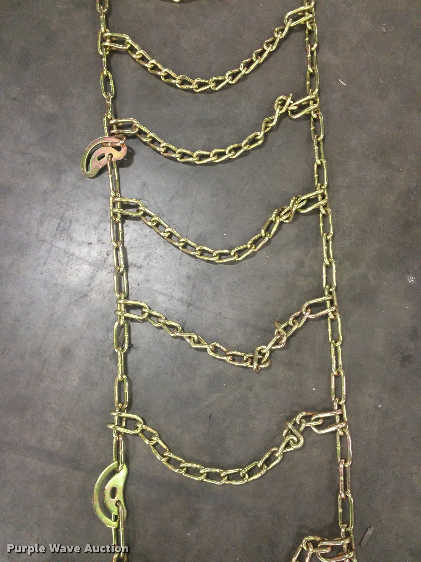 (4) Case 12x16.5 hardened skid steer tire chains in Tonganoxie, KS Item F1114 sold Purple Wave