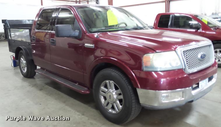 image for item K8183 2004 Ford F150 Lariat SuperCrew flatbed pickup truck