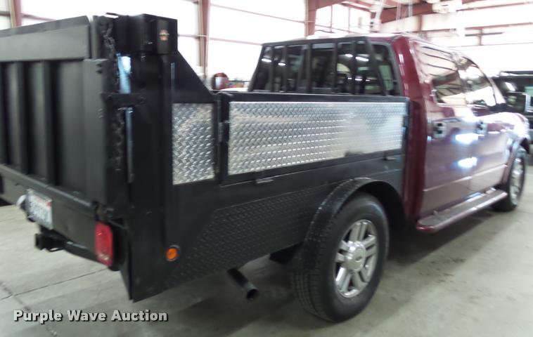 image for item K8183 2004 Ford F150 Lariat SuperCrew flatbed pickup truck