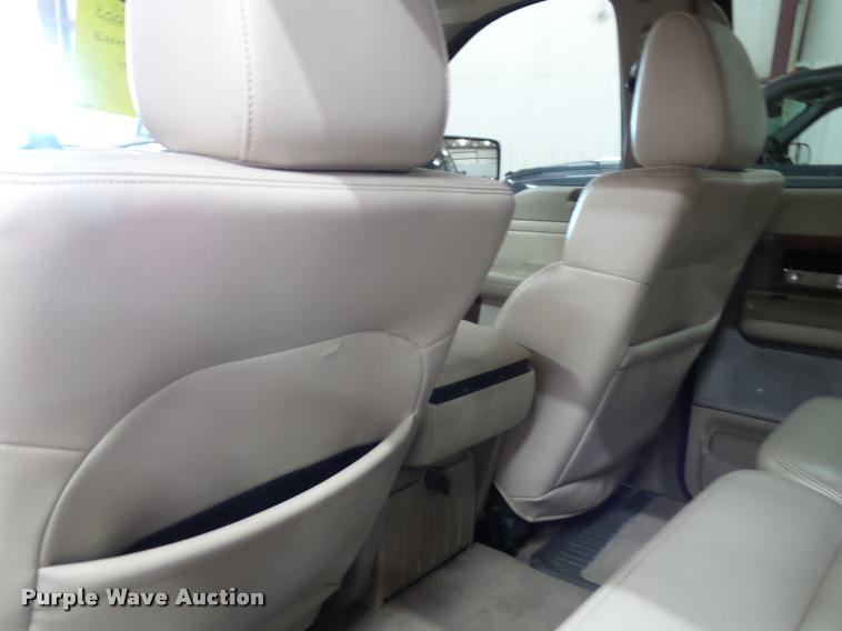 image for item K8183 2004 Ford F150 Lariat SuperCrew flatbed pickup truck