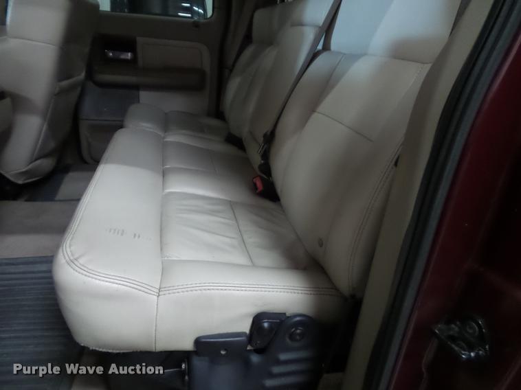 image for item K8183 2004 Ford F150 Lariat SuperCrew flatbed pickup truck