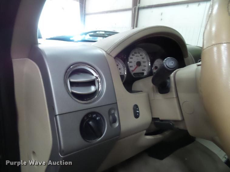 image for item K8183 2004 Ford F150 Lariat SuperCrew flatbed pickup truck