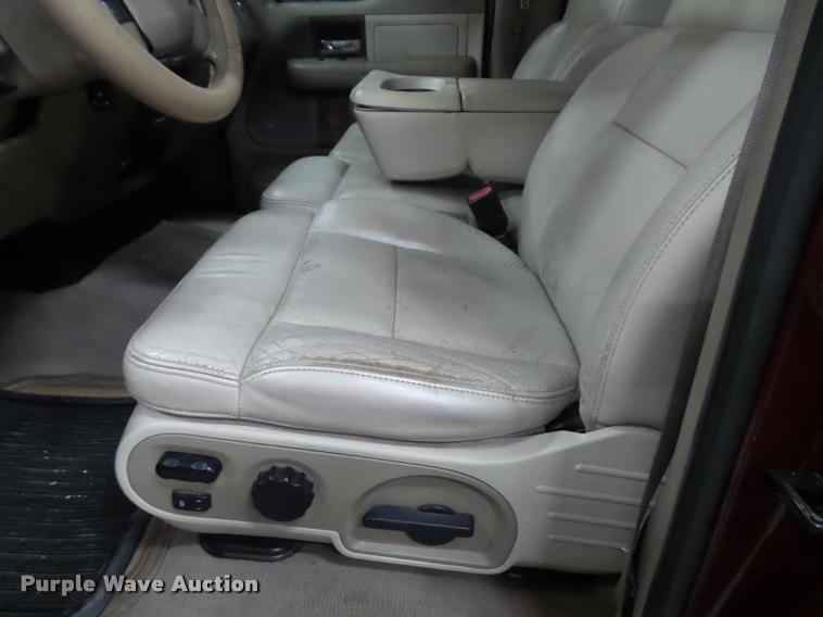 image for item K8183 2004 Ford F150 Lariat SuperCrew flatbed pickup truck