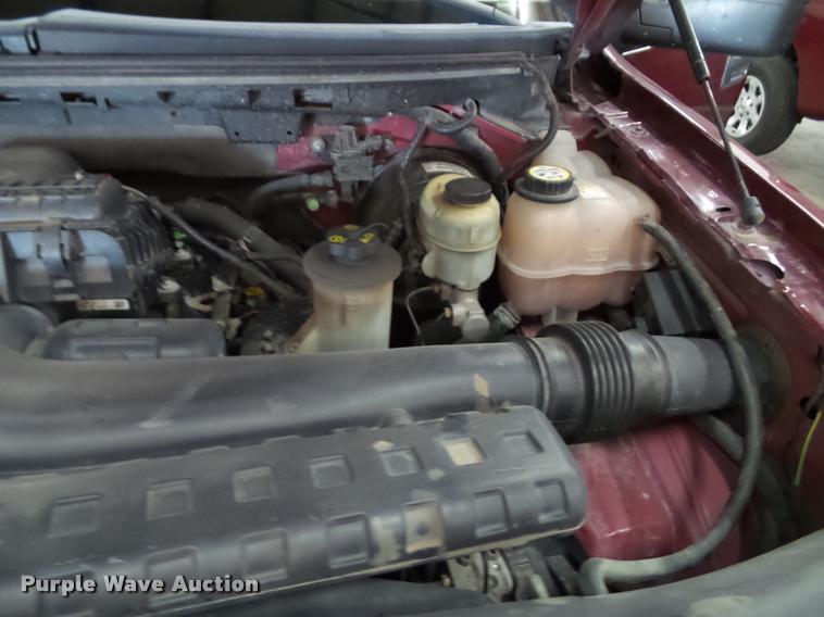 image for item K8183 2004 Ford F150 Lariat SuperCrew flatbed pickup truck