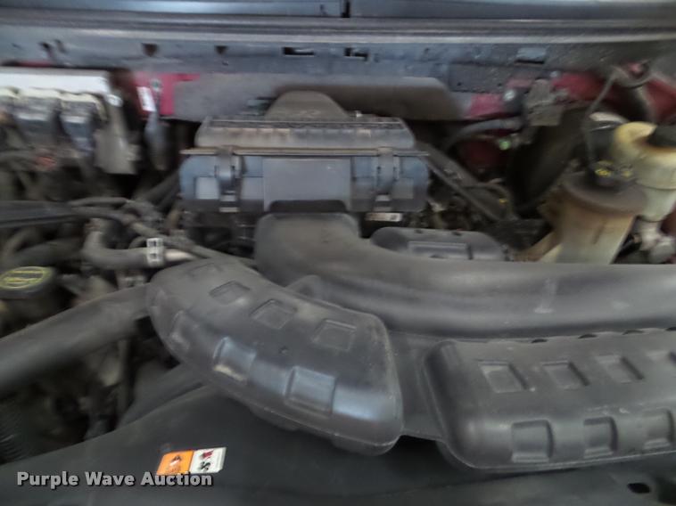 image for item K8183 2004 Ford F150 Lariat SuperCrew flatbed pickup truck