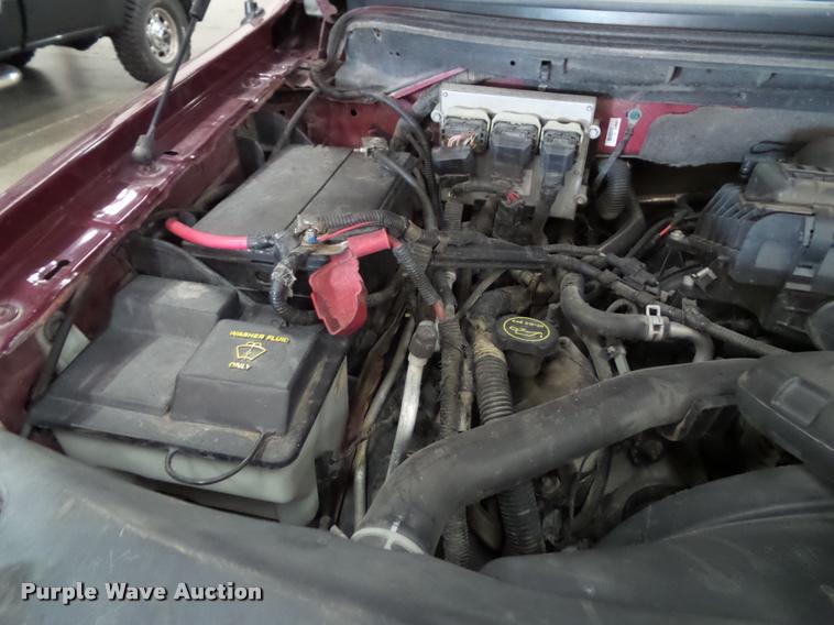 image for item K8183 2004 Ford F150 Lariat SuperCrew flatbed pickup truck