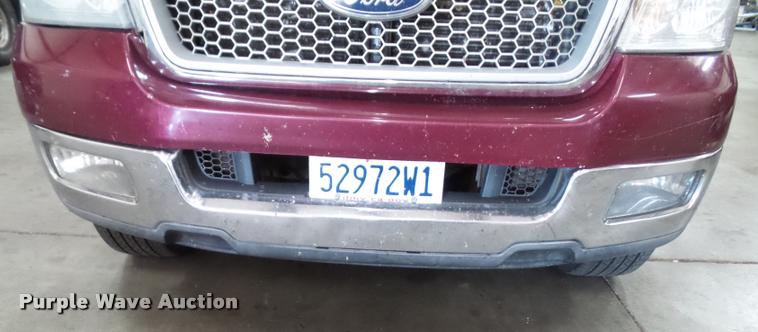 image for item K8183 2004 Ford F150 Lariat SuperCrew flatbed pickup truck