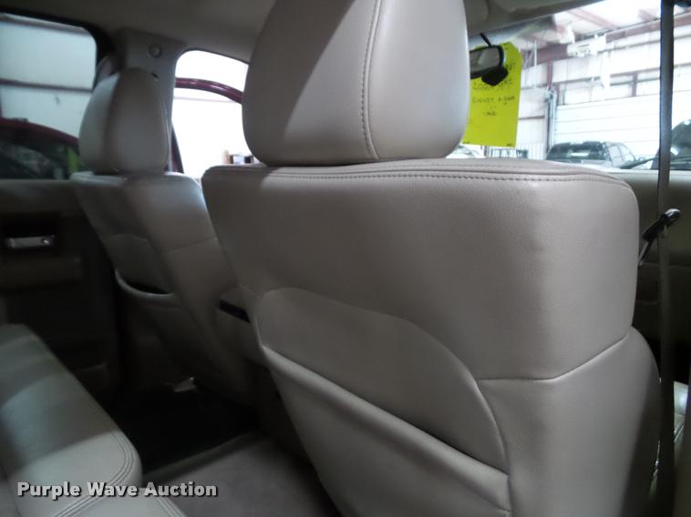 image for item K8183 2004 Ford F150 Lariat SuperCrew flatbed pickup truck