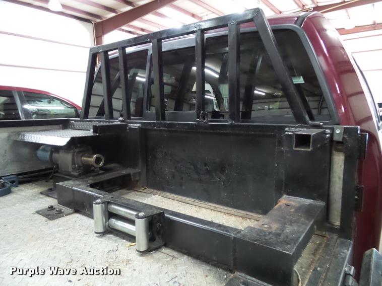 image for item K8183 2004 Ford F150 Lariat SuperCrew flatbed pickup truck