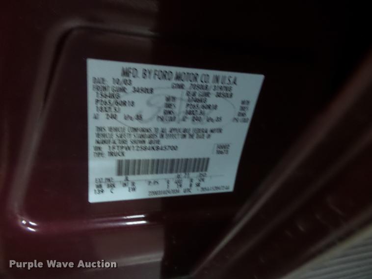 image for item K8183 2004 Ford F150 Lariat SuperCrew flatbed pickup truck