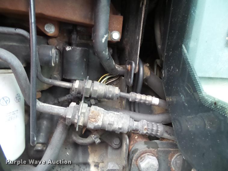 image for item J4772 2003 New Holland TS100 tractor