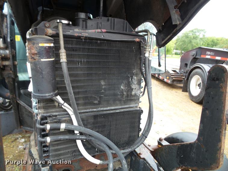 image for item J4772 2003 New Holland TS100 tractor